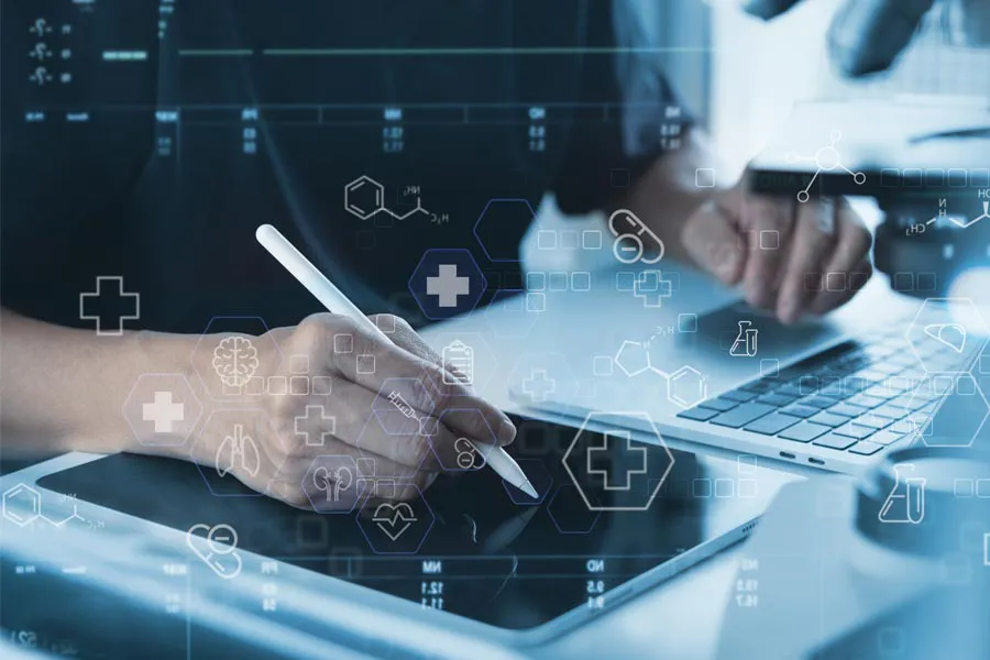 Health-Conditions-Treated-Doctor Close-up of a medical professional using a laptop and tablet, with illustrated medical symbols overlayed on the image, symbolizing health conditions treated by Genifer Chavez, MD in Tucson.